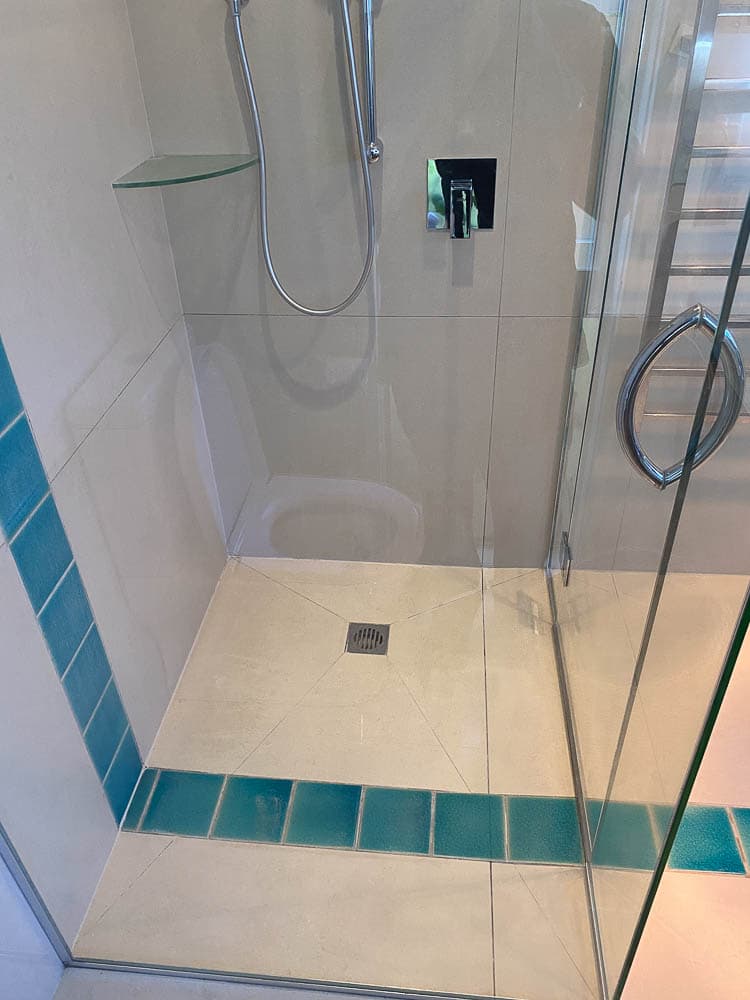 Treatments for shower glass